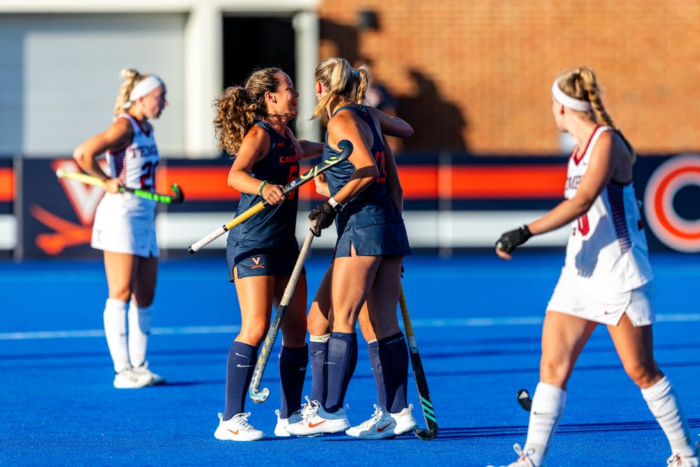 <p>The Cavaliers celebrate a goal against Temple.</p>