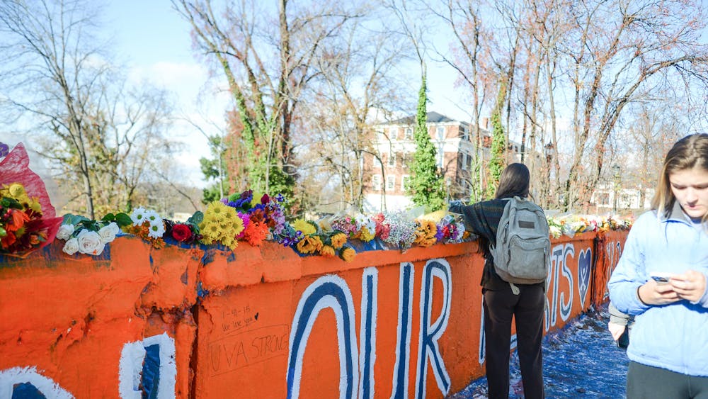 Hundreds of students painted Beta Bridge and wrote handwritten messages, enshrining the memories of Devin, Lavel and D’Sean and community support for their families in Charlottesville history.&nbsp;