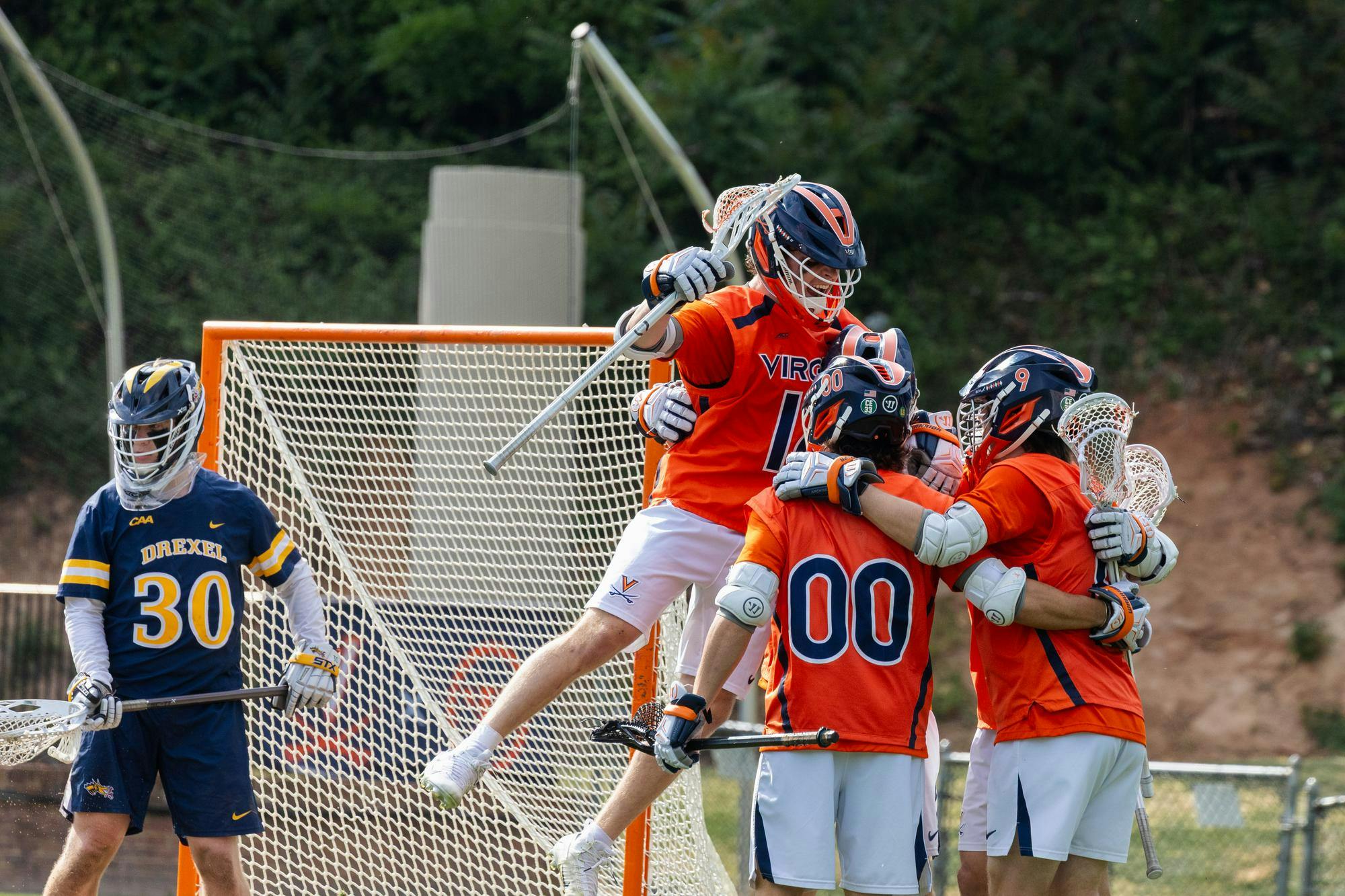 As I’ve spent more time behind the camera, I’ve focused on improving my ability to anticipate action, refine composition and adapt to fast-paced environments. This collection highlights my favorite sports photographs from the semester, reflecting the energy of U.Va. athletics and my personal growth in capturing moments of intensity, motion and emotion.