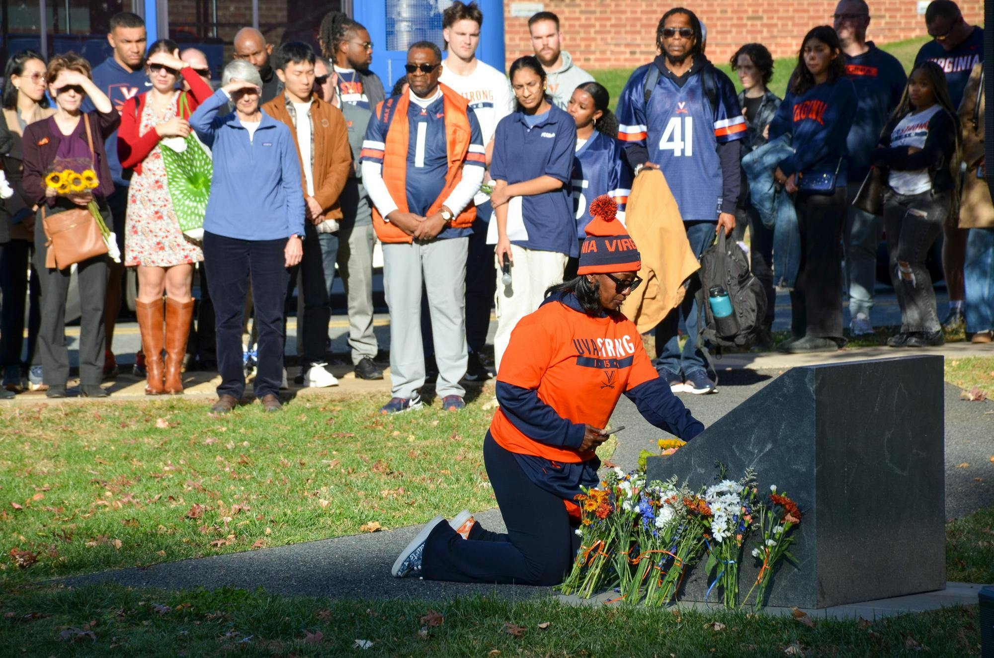 At 1:55 p.m. on Thursday, Nov. 13, the University Chapel bells played the first verse of “Amazing Grace” before ringing the three final chimes, honoring the lives of Lavel Davis Jr., D’Sean Perry and Devin Chandler who were killed during the University shooting three years ago. Immediately after the bell toll, attendees began a memorial march from the Chapel to the memorial tree at the Betsy and John Casteen Arts Grounds, near where the tragic shooting took place three years ago, for a remembrance ceremony.