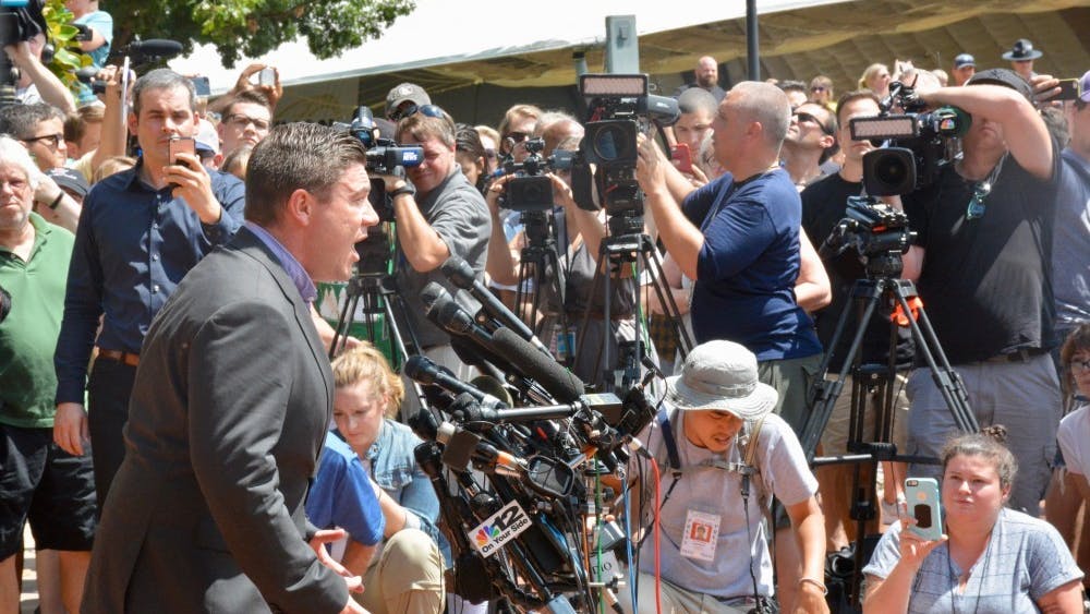 Jason Kessler attempting to speak at his press conference Aug. 13, before the event descended into chaos.&nbsp;