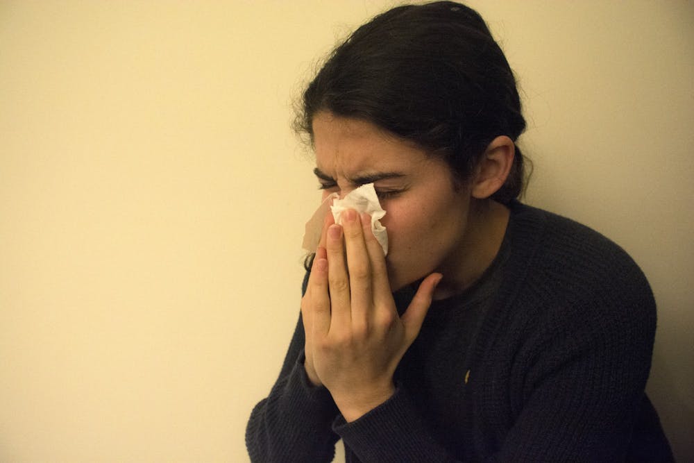 Spread by the influenza virus, the flu is a contagious respiratory illness associated with symptoms such as fever, cough, runny nose, vomiting and headaches.&nbsp;