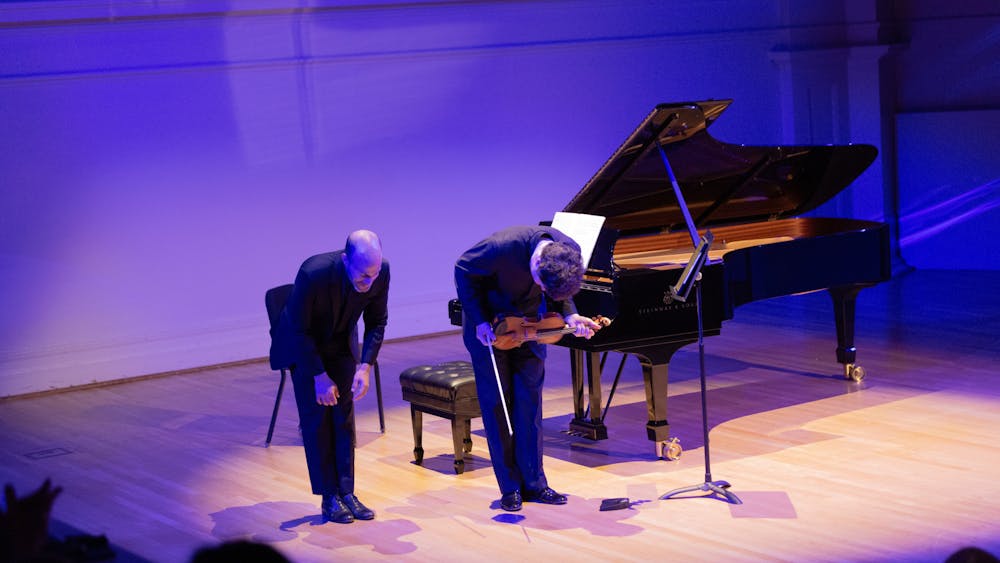 As Hadelich and Weiss — clad in sleek, black button-ups — emerged onto the Old Cabell stage and took their first bow, concertgoers found themselves in hushed awe and anticipation of the performance.