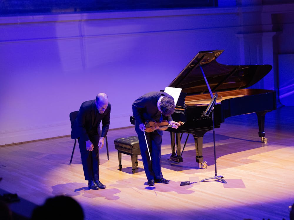 As Hadelich and Weiss — clad in sleek, black button-ups — emerged onto the Old Cabell stage and took their first bow, concertgoers found themselves in hushed awe and anticipation of the performance.