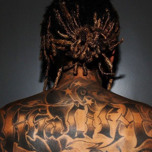 Khalifa, with his "Khalifa" tattoo, on the cover of "Khalifa"