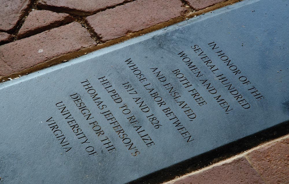 A plaque commemorating the several hundred enslaved laborers who helped to build the University.