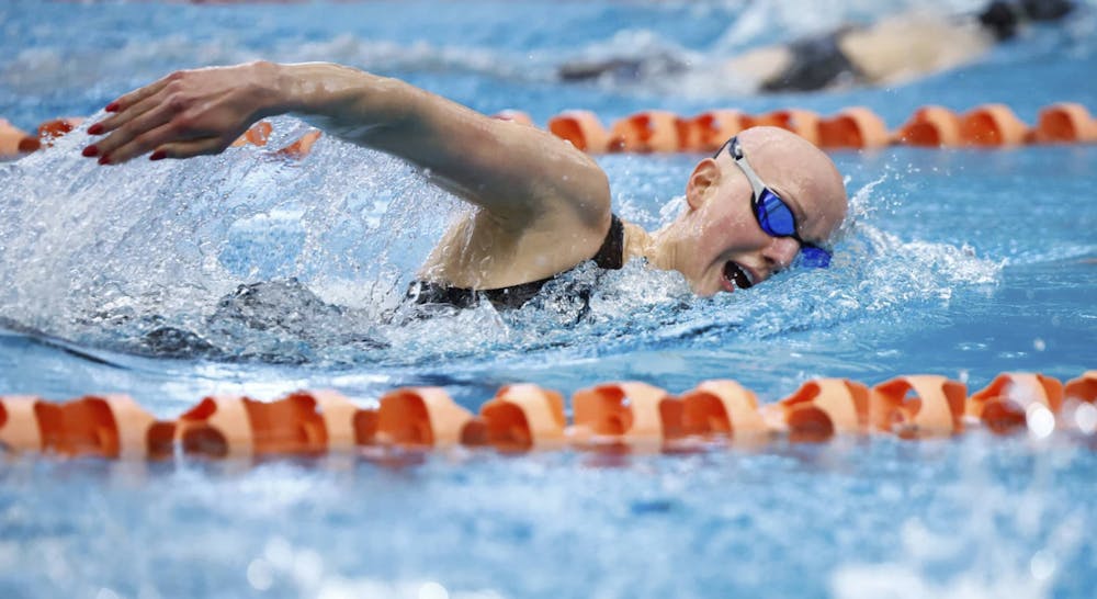 Hayes glides through the water against Virginia Tech Jan. 11.