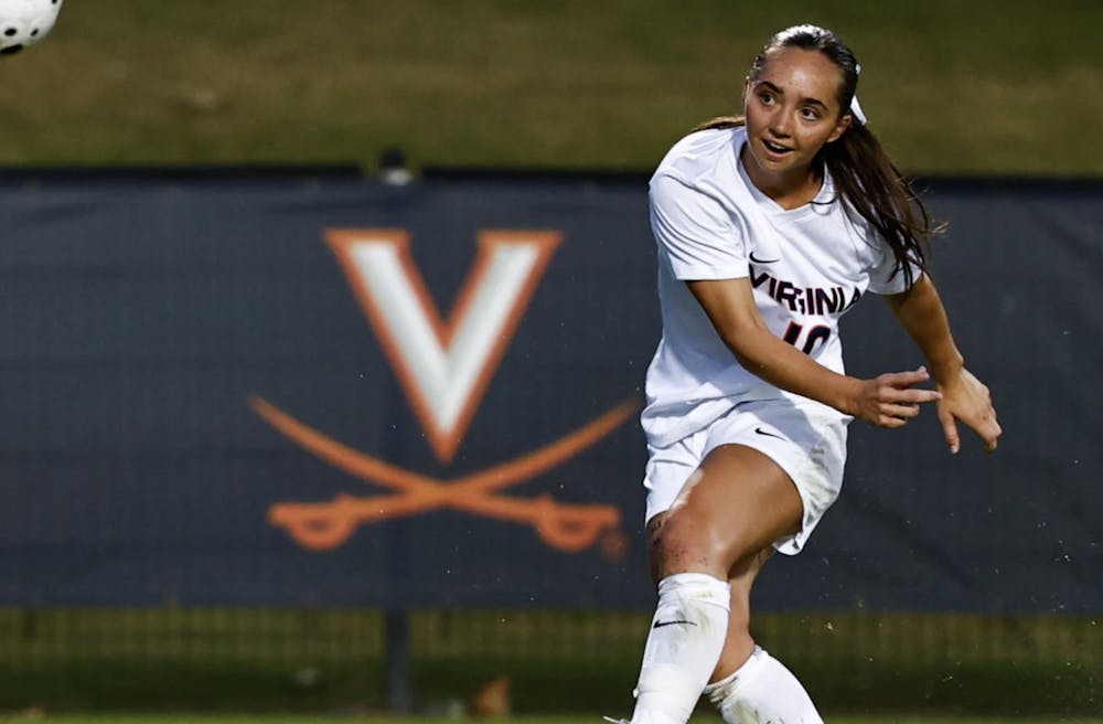 <p>Maggie Cagle watches a left-footed ball fly Sunday at Klöckner Stadium.</p>