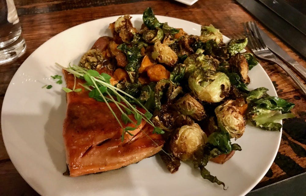 Baked salmon, sweet potatoes and brussel sprouts is a surprisingly easy dinner to make. 