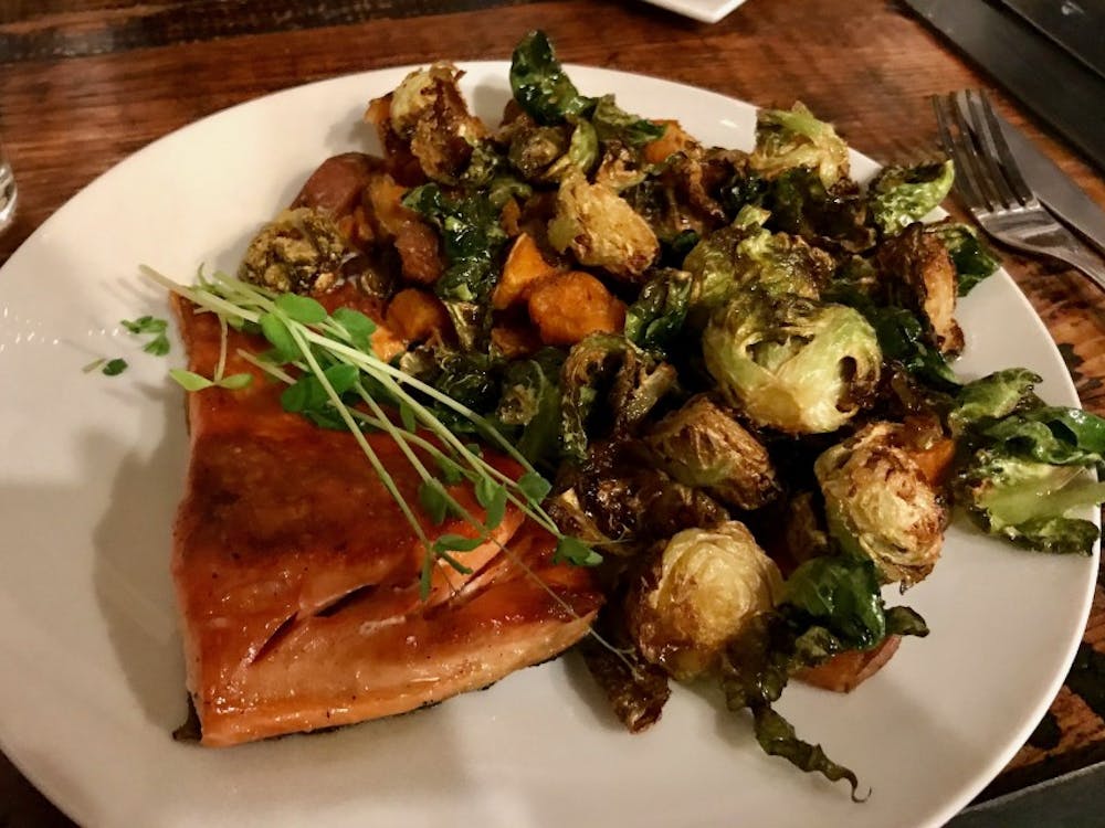 Baked salmon, sweet potatoes and brussel sprouts is a surprisingly easy dinner to make. 
