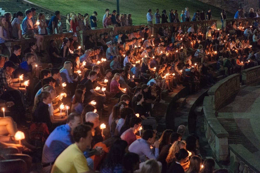 Students and community members filled the amphitheater for the vigil.&nbsp;