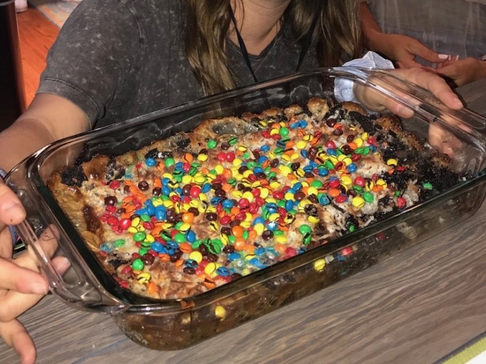 This delicious dessert consists mainly of Oreo cookies, M&amp;M's and coconut.&nbsp;