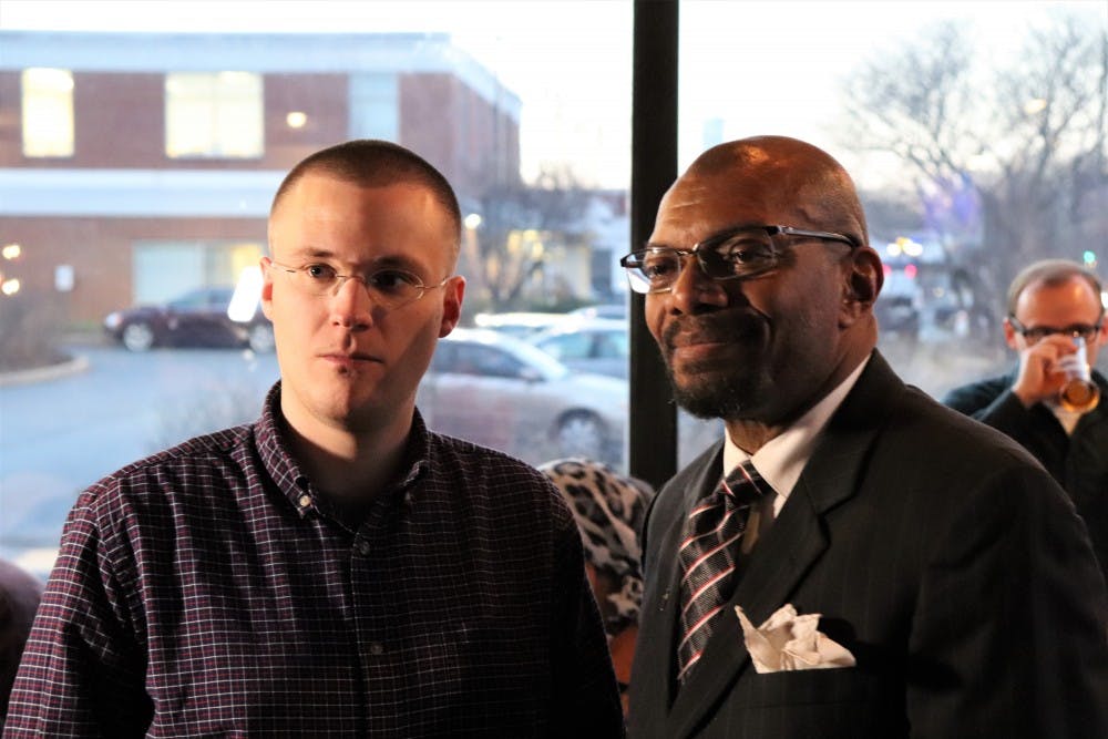 Michael Payne (left) and Don Gathers (right) pose for photos at their joint campaign launch event Jan. 8.&nbsp;