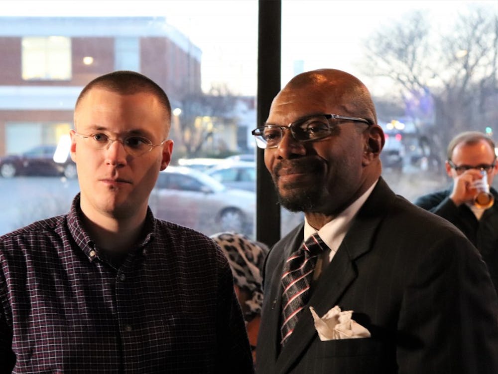 Michael Payne (left) and Don Gathers (right) pose for photos at their joint campaign launch event Jan. 8.&nbsp;