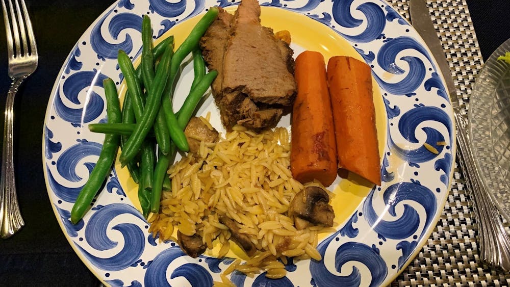 My family's typical Christmas Eve/birthday dinner consists of brisket, carrots, orzo, orange jello and green beans — all top-secret family recipes. &nbsp;