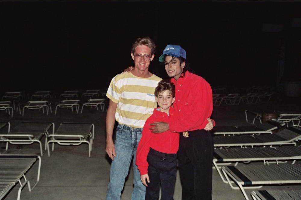Michael Jackson with James Safechuck (center), who alleges a pattern of sexual abuse by the late singer.&nbsp;