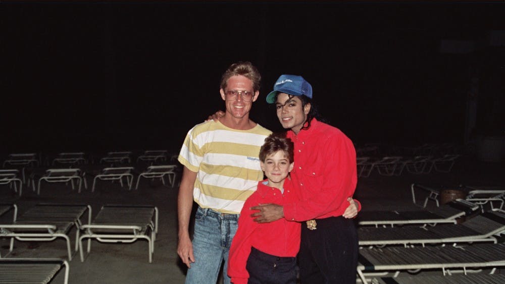 Michael Jackson with James Safechuck (center), who alleges a pattern of sexual abuse by the late singer.&nbsp;