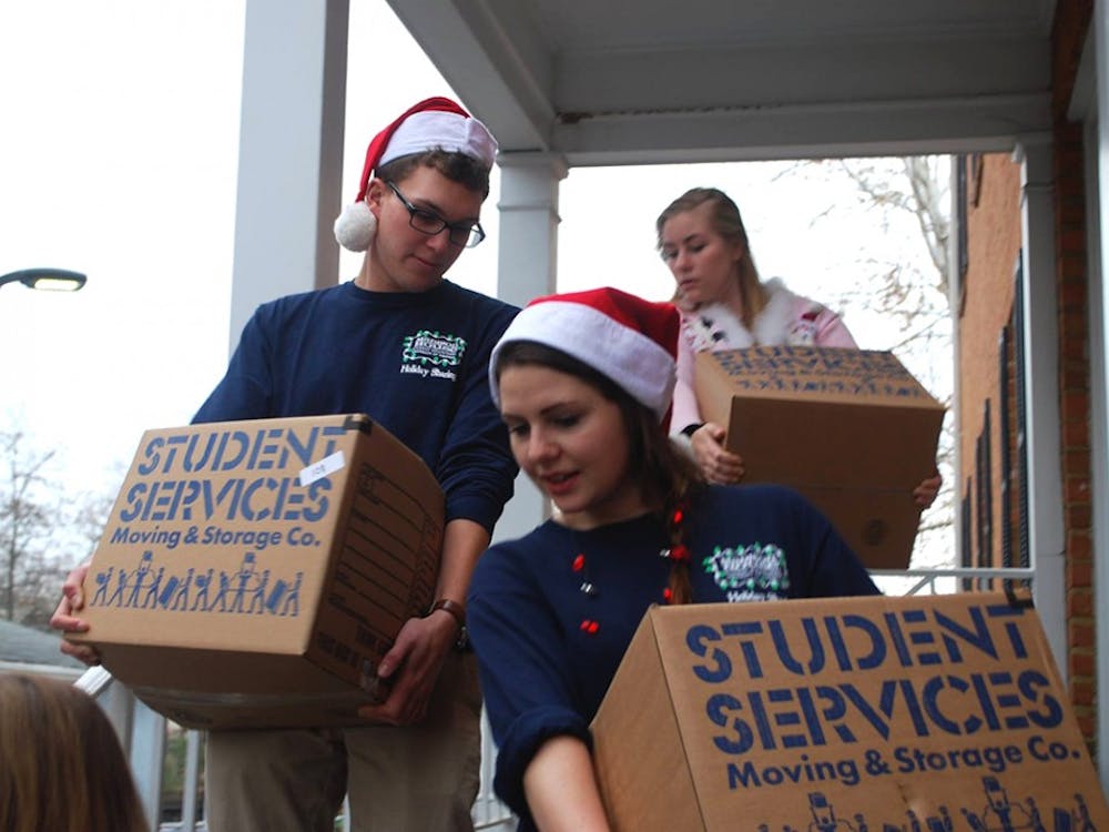 Madison House Holiday Sharing volunteers collect gifts and food for families at the holidays. 