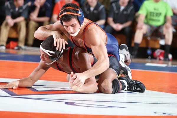 No. 14 redshirt senior Joe Spisak captured the 141-pound championship Sunday in Blacksburg, Virginia. 