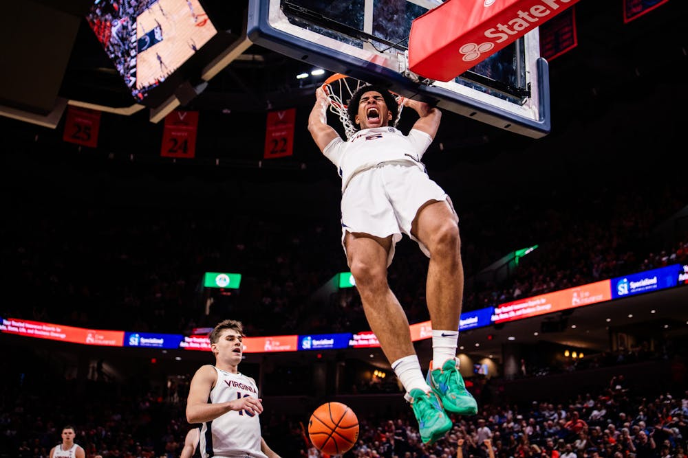 <p>Cofie thunders home a dunk.</p>