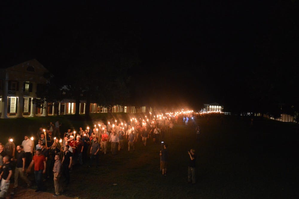<p>White nationalists held a torchlit march through Grounds on Aug. 11.&nbsp;</p>
