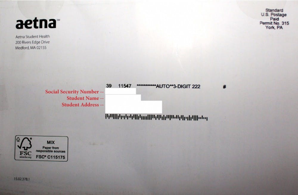 	<p>A mailer sent by Aetna Student Health company informing students of available insurance plans for the 2013-14 academic year included students&#8217; social security numbers on the address labels. [RED <span class="caps">LETTERS</span> added — actual information removed to protect privacy.]</p>