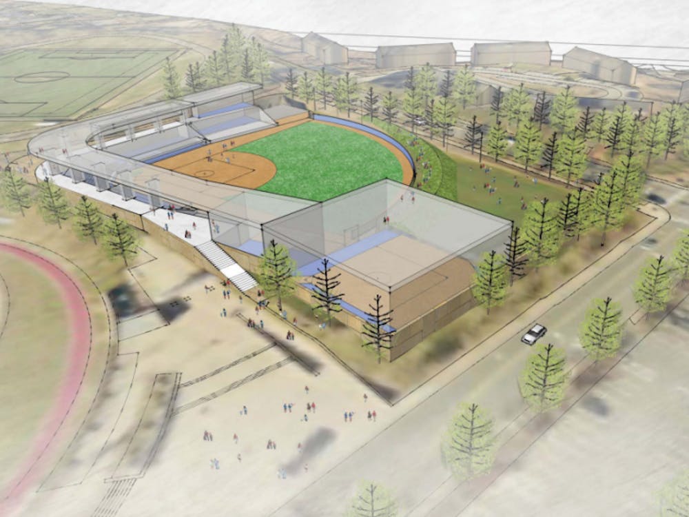 The new softball stadium would replace a grass soccer and lacrosse practice field on Massie Road and Copeley Road.