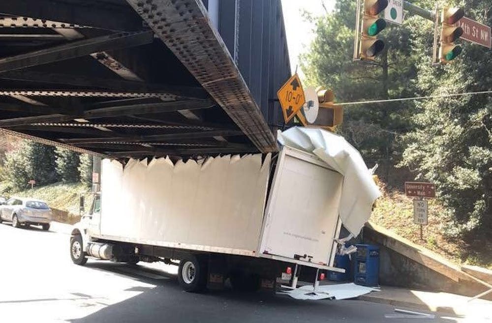 <p>&nbsp;The University Ave bridge claims yet another four-wheeled victim.</p>