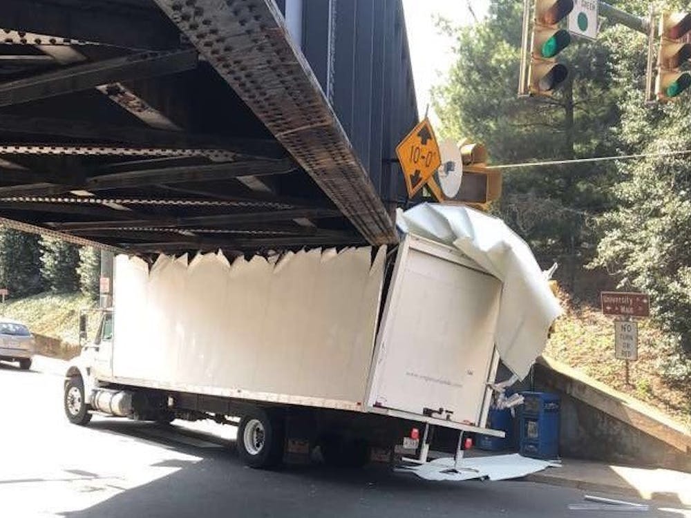  The University Ave bridge claims yet another four-wheeled victim.