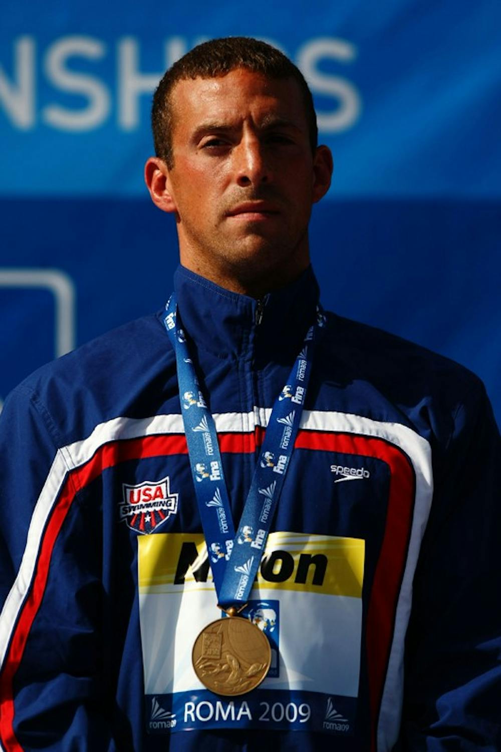 ROME - JULY 24:  Francis Crippen of USA receives his Bronze medal for the 10 km Men's Open Water Final during the 13th FINA World Championships at the Stadio del Nuoto on July 24, 2009 in Rome, Italy.  (Photo by Lars Baron/Getty Images) *** Local Caption *** Francis Crippen