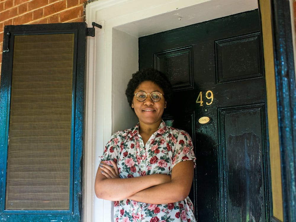 Second-year Architecture masters student Ucha Abbah poses in front of her room on the Range. 