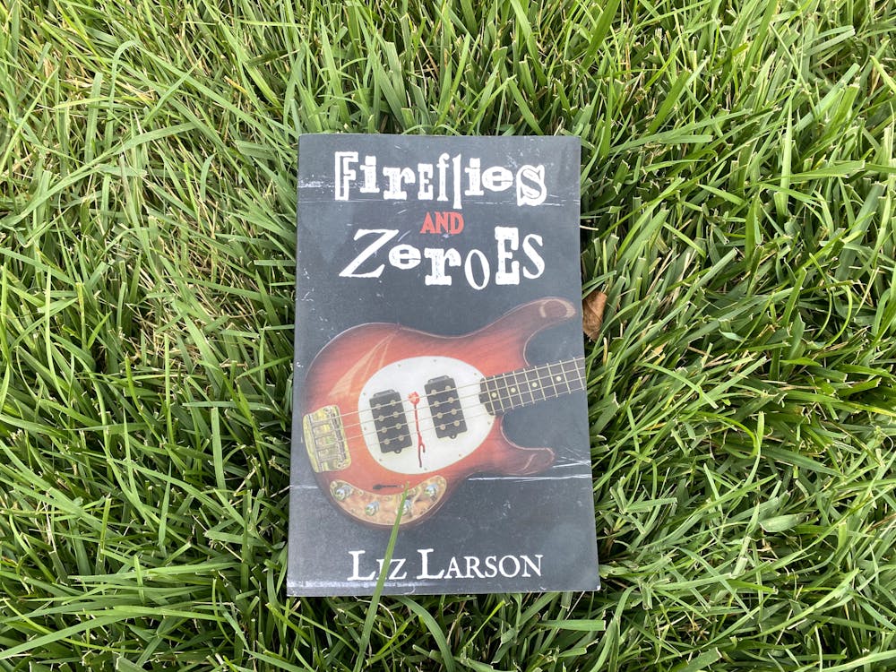 In her debut novel “Fireflies and Zeroes,” Liz Larson shares the shimmering firefly-like charm of Charlottesville alongside the city’s flaws. 