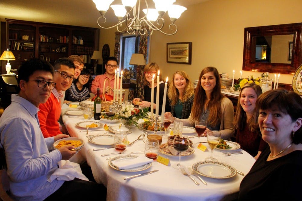 Prof. Dorothy Kelly hosting a Thanksgiving dinner as part of the Meal Match program in 2015.&nbsp;