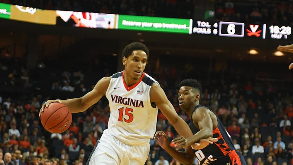 Senior guard Malcolm Brogdon torched the Colonials for 28 points and eight rebounds, but the Cavaliers shot just 40.3 percent as a team. 