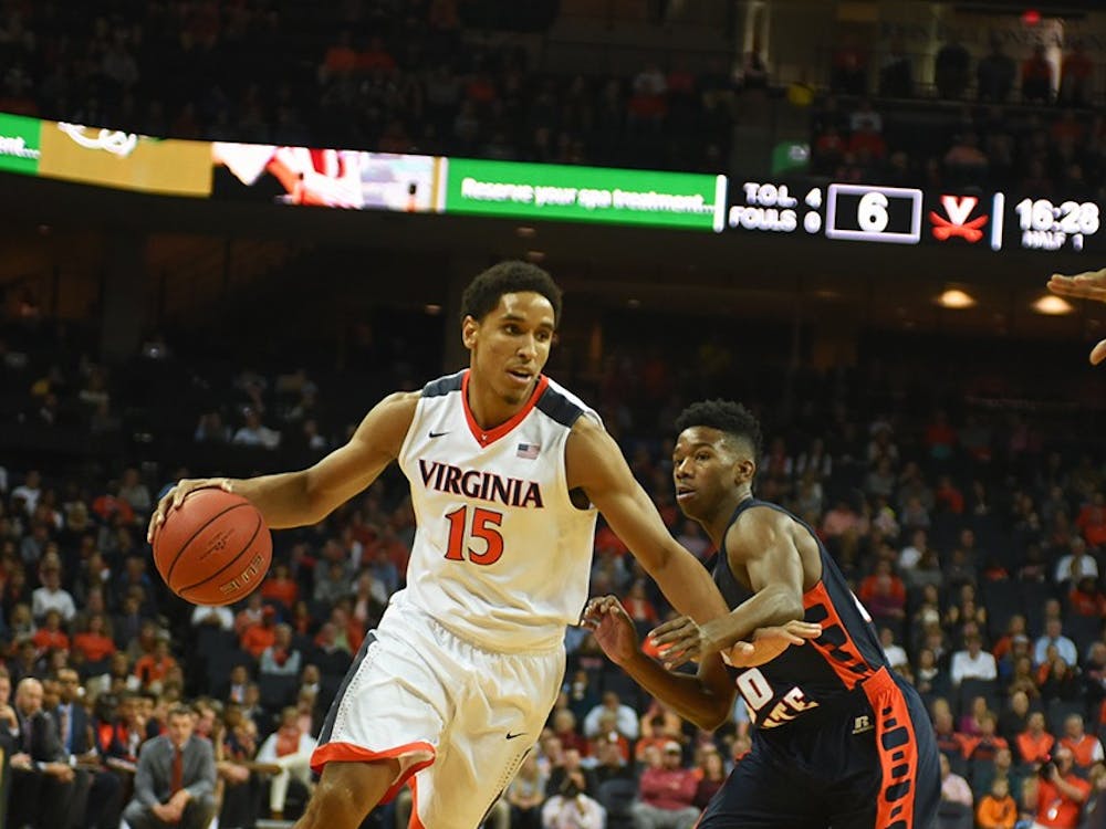 Senior guard Malcolm Brogdon torched the Colonials for 28 points and eight rebounds, but the Cavaliers shot just 40.3 percent as a team. 