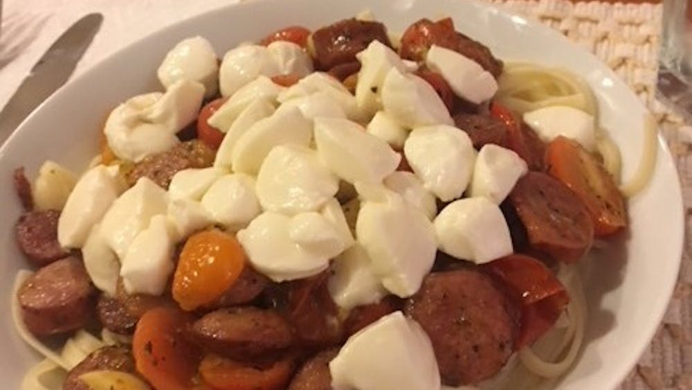 Linguini with sausage, tomatoes and fresh mozzarella.