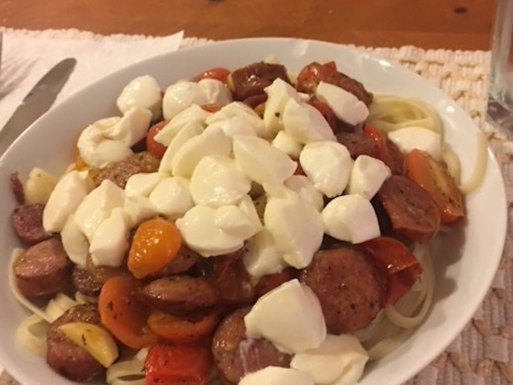 Linguini with sausage, tomatoes and fresh mozzarella.