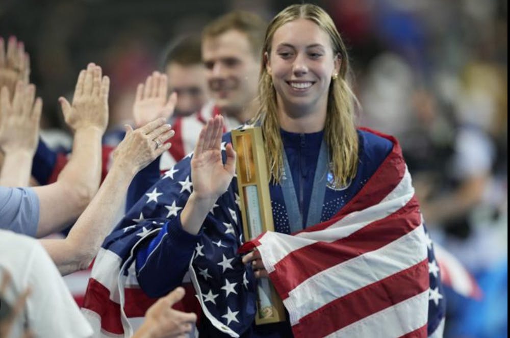 Gretchen Walsh celebrates after another dominant race.