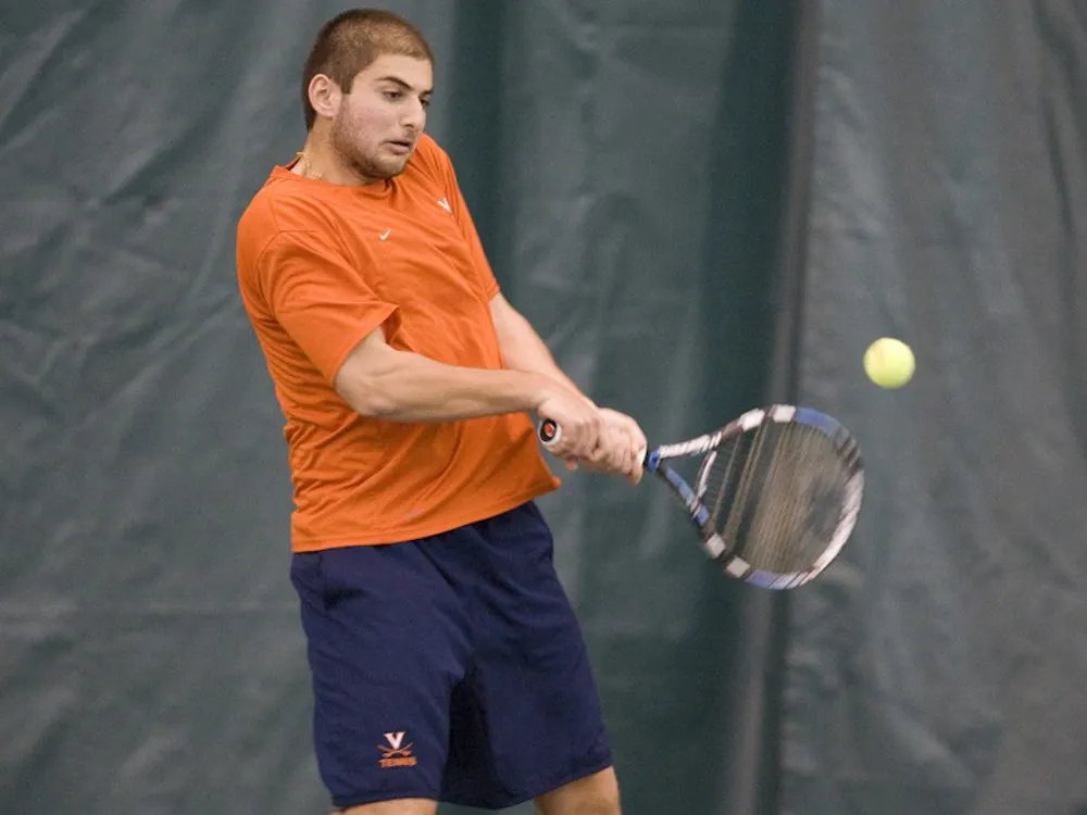 Michael Shabaz in action against Texas. The #1 ranked Virginia Cavaliers men's tennis team defeated the #5 ranked Texas Longhorns 5-2 at the Boyd Tinsley Courts at the Boar's Head Inn and Resort in Charlottesville, VA on February 29, 2008.