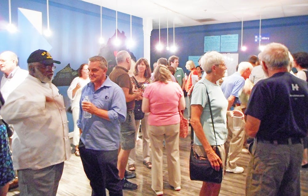 Dozens of staffers, volunteers and community members attended the event on Tuesday night to show support for Hillary Clinton in the presidential race.&nbsp;