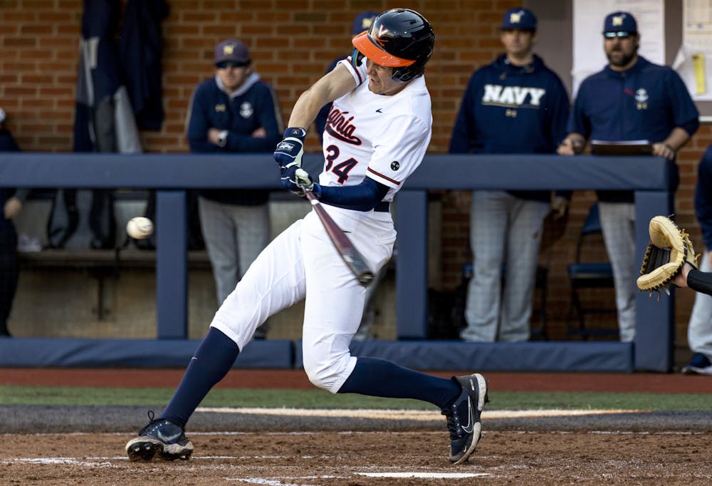 Harrison Didawick swings for the fences against Navy.