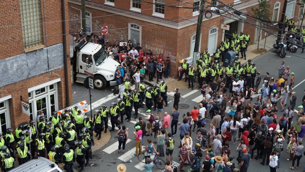 There was tension between protesters and police Sunday at the intersection of Fourth Street and Water Street Sunday afternoon. This was the site of last year's car attack near the Downtown Mall. 
