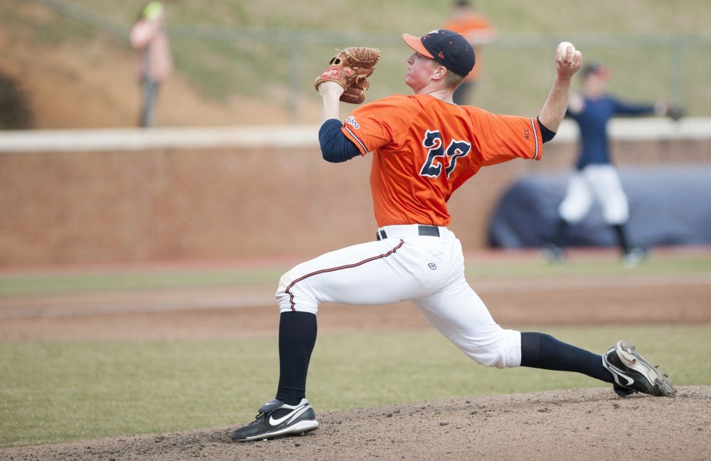 	Sophomore right-hander Josh Sborz pitched five innings between Friday night and Saturday afternoon as the Virginia baseball team repelled the Rebels in Omaha. 