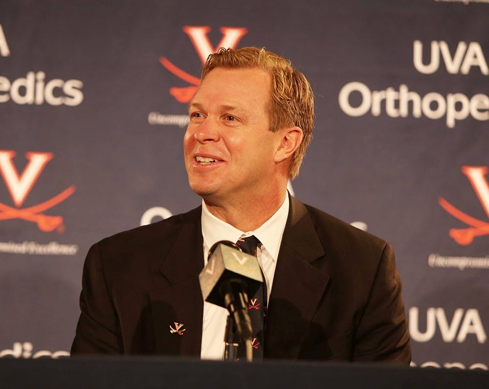 Newly-hired football coach Bronco Mendenhall met members of the University community and media for the first time Monday