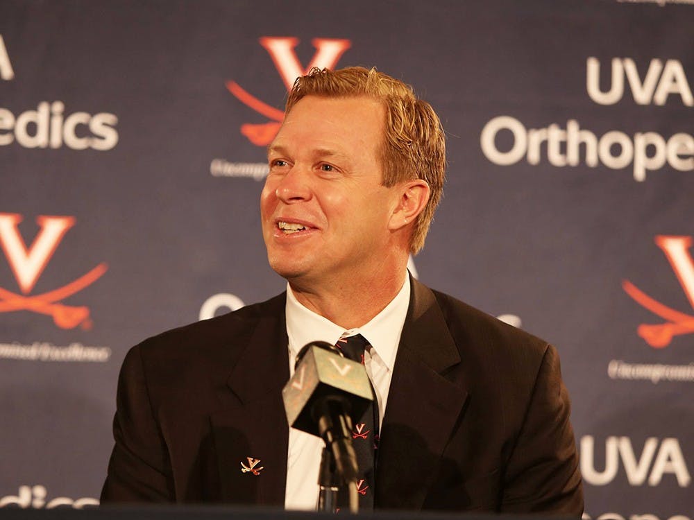 Newly-hired football coach Bronco Mendenhall met members of the University community and media for the first time Monday