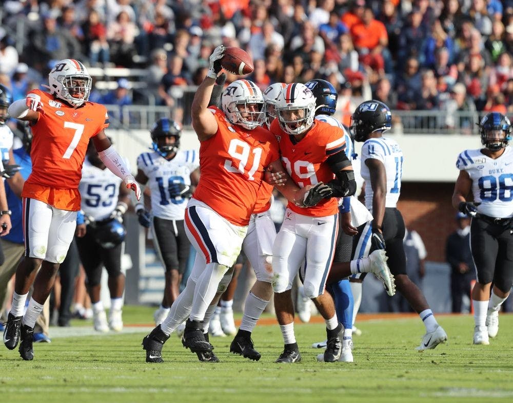 The Cavaliers celebrate after one of five turnovers in their blowout win over the Blue Devils in 2019.