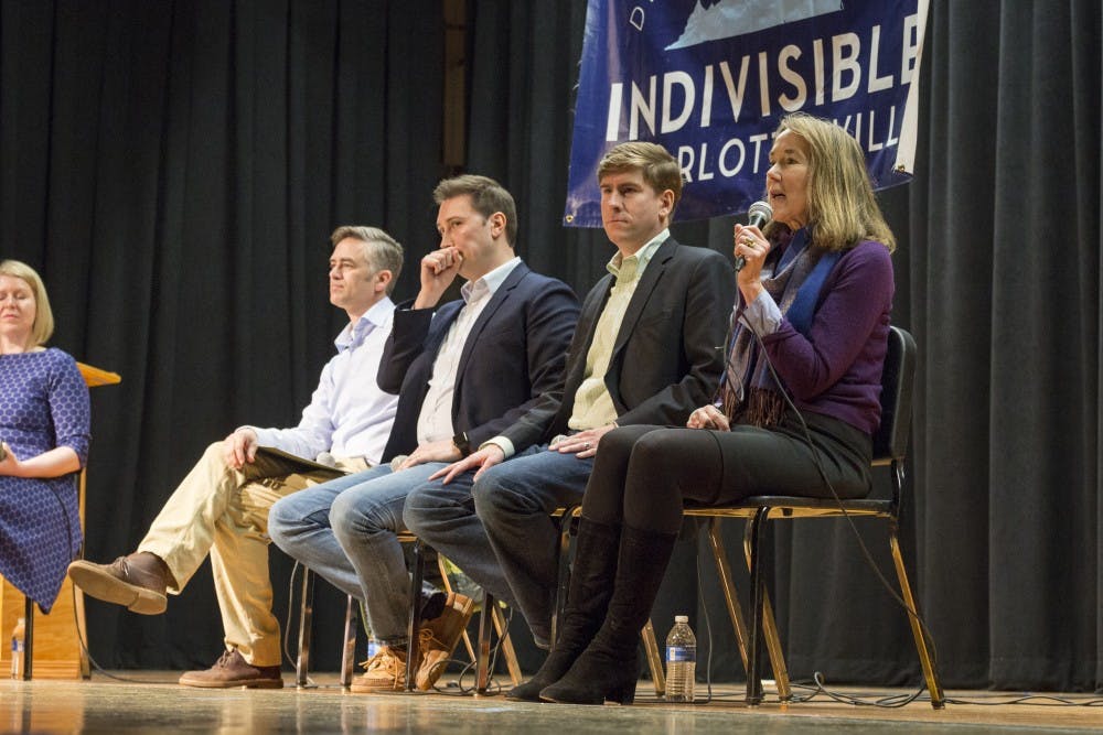 From left, candidates Andrew Sneathern, Roger Dean Huffstetler, Ben Cullop and Leslie Cockburn discussed issues ranging from healthcare to gun policy to higher education.