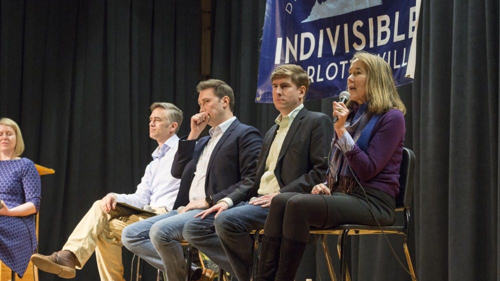 From left, candidates Andrew Sneathern, Roger Dean Huffstetler, Ben Cullop and Leslie Cockburn discussed issues ranging from healthcare to gun policy to higher education.