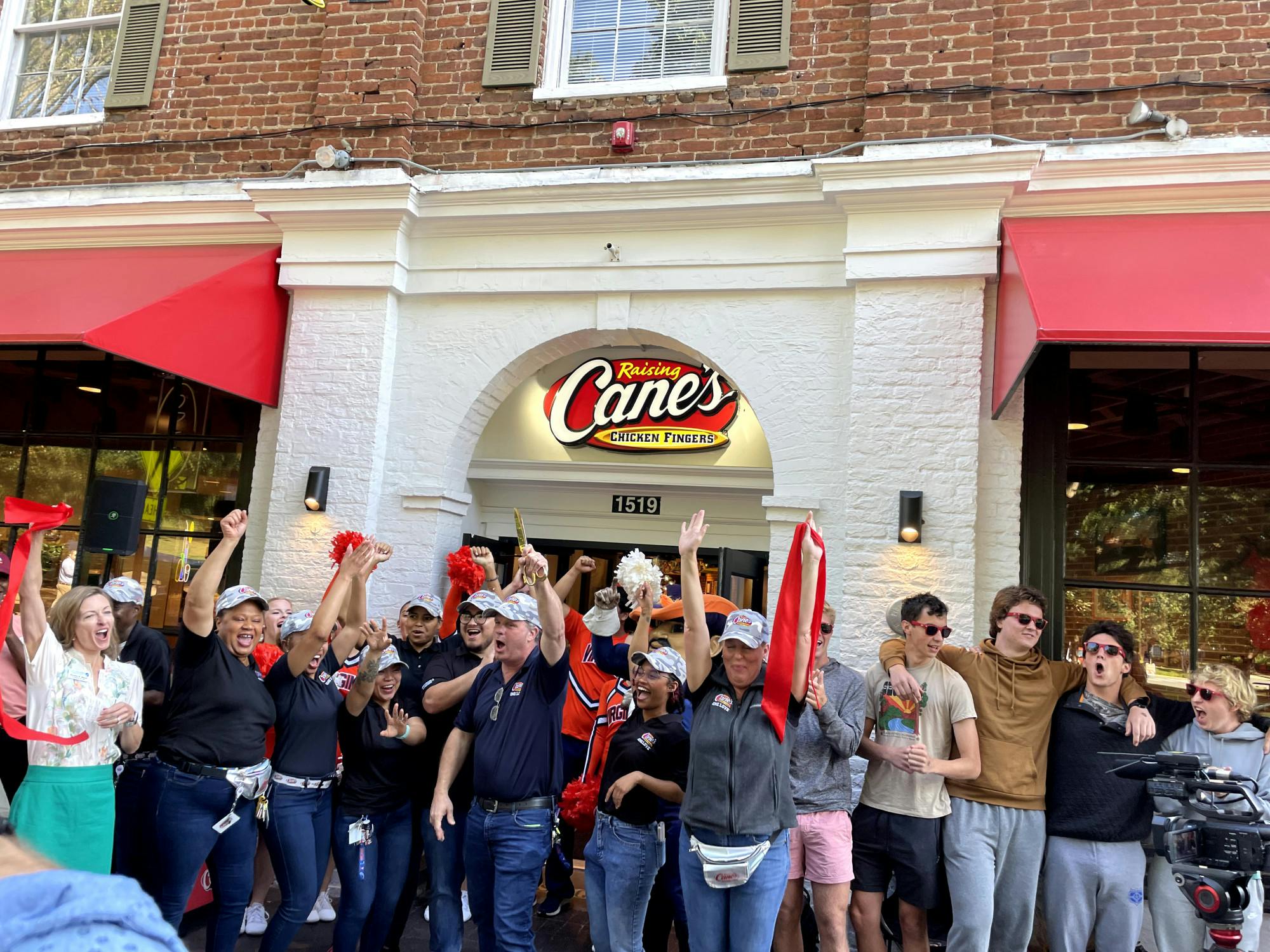 University cheerleaders and Cane’s staff encouraged the crowd to make noise and shouted call-and-response chants.