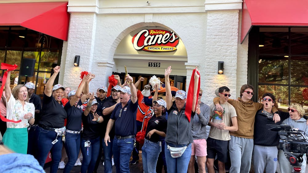 University cheerleaders and Cane’s staff encouraged the crowd to make noise and shouted call-and-response chants.